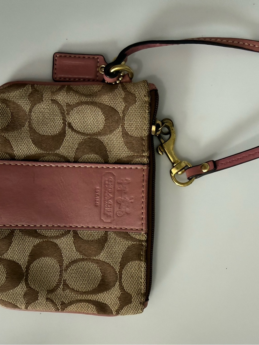 COACH Corner Zip Wristlet in Signature Canvas with Pink Leather Stripe